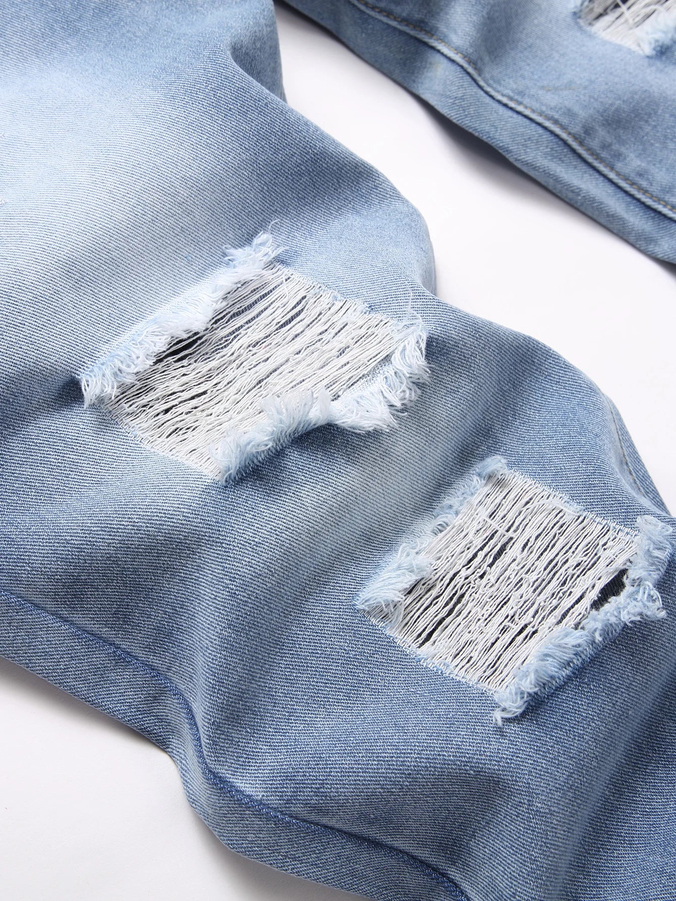 Men's Jeans - Distressed Rips & Embroidered Star Design